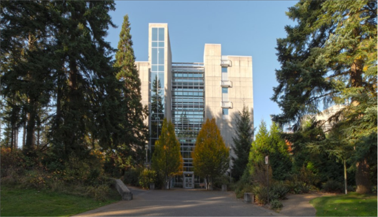 A picture of the ECS building prior to the expansion, a large walkway leads to the main doors.