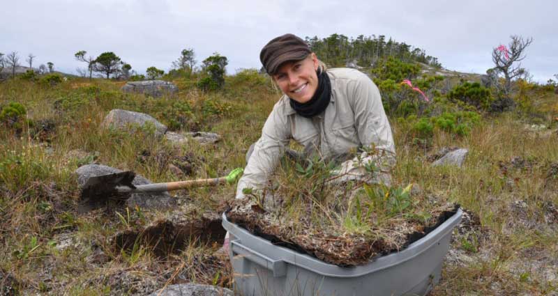 Student Kira in the bog with her samples