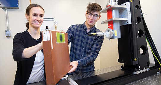 UVic medical physicist Magdalena Bazalova-Carter and graduate student Dylan Breitkreutz are researching how to reduce the cost of radiation therapy.