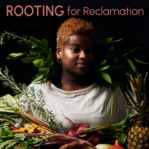 A person surrounded by various fruits and vegetables