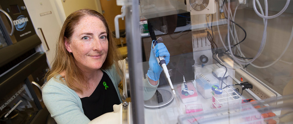 University of Victoria microbiologist, Caroline Cameron in the lab.