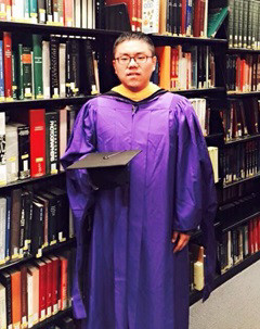 Photo of Bo Liu in library